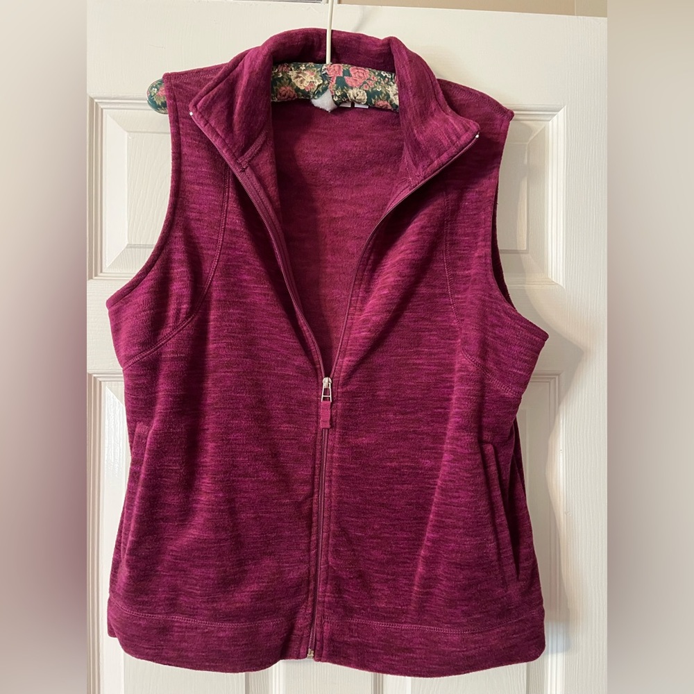 Ladies zip up vest.